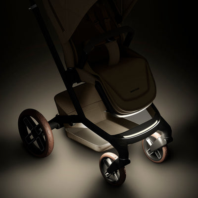 Maxi-Cosi Fame Premium 10 Piece Travel System - Twillic Truffle/Brown Wheels
