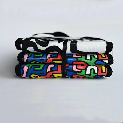 ETTA LOVES x KEITH HARING Sensory Strip- reversible newborn to 4 months / 5+ months